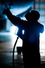 Airmen from the 5th Aircraft Maintenance Squadron wash a B-52H Stratofortress at Minot Air Force Base, N.D., Feb. 14, 2017. It takes the nine-Airman team two days and approximately 10 gallons of soap to wash each jet when it comes in for its routine wash every 120 days. (U.S. Air Force photo/Senior Airman J.T. Armstrong)