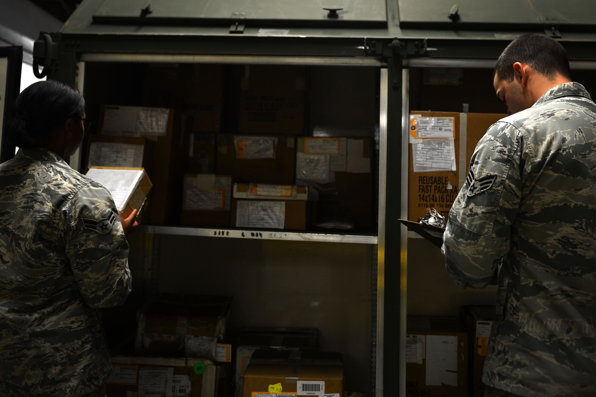 U.S. Airmen assigned to the 20th Logistics Readiness Squadron aircraft parts store check inventory at Shaw Air Force Base, S.C., March 1, 2017. Aircraft parts store Airmen ensure all items are accounted for and ready to be sent out should they be requested. (U.S. Air Force photo by Airman 1st Class Christopher Maldonado)