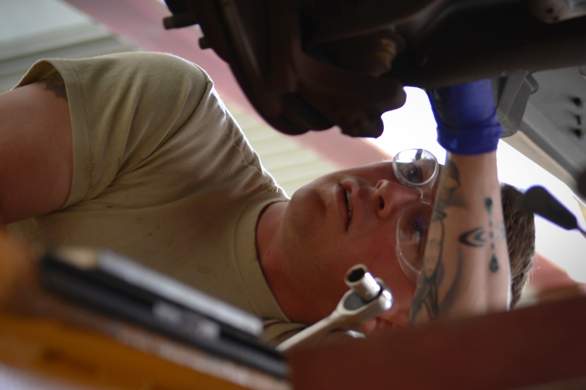 U.S. Air Force Senior Airman Joseph Beasley, 20th Logistics Readiness Squadron, vehicle maintenance journeyman, inspects a bolt on a vehicle at Shaw Air Force Base, S.C., March 2, 2017. Airmen assigned to the vehicle maintenance flight troubleshoot and repair complications on government vehicles ranging from 20th Security Forces Squadron police cruiser to buses. (U.S. Air Force photo by Airman 1st Class Christopher Maldonado)