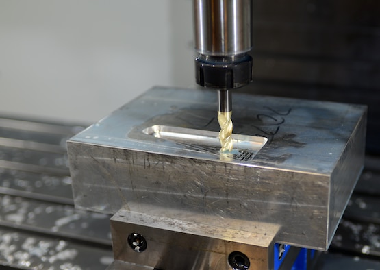 A block of aluminum is shaped using the new VF5 Super Speed at Ellsworth Air Force Base, S.D., Feb. 22, 2017. The Fabrication Flight of the 28th Maintenance Squadron, received new equipment that allows them to perform their daily operations more efficiently and quickly. (U.S. Air Force photo by Airman 1st Class Donald C. Knechtel)