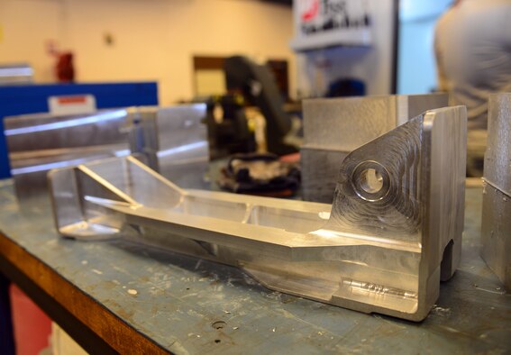 A main landing gear support bracket is forged in the fabrication shop at Ellsworth Air Force Base, S.D., Feb. 22, 2017. The support bracket is used to hold the actuator in lace, enabling the main landing gear together. (U.S. Air Force photo by Airman 1st Class Donald C. Knechtel)