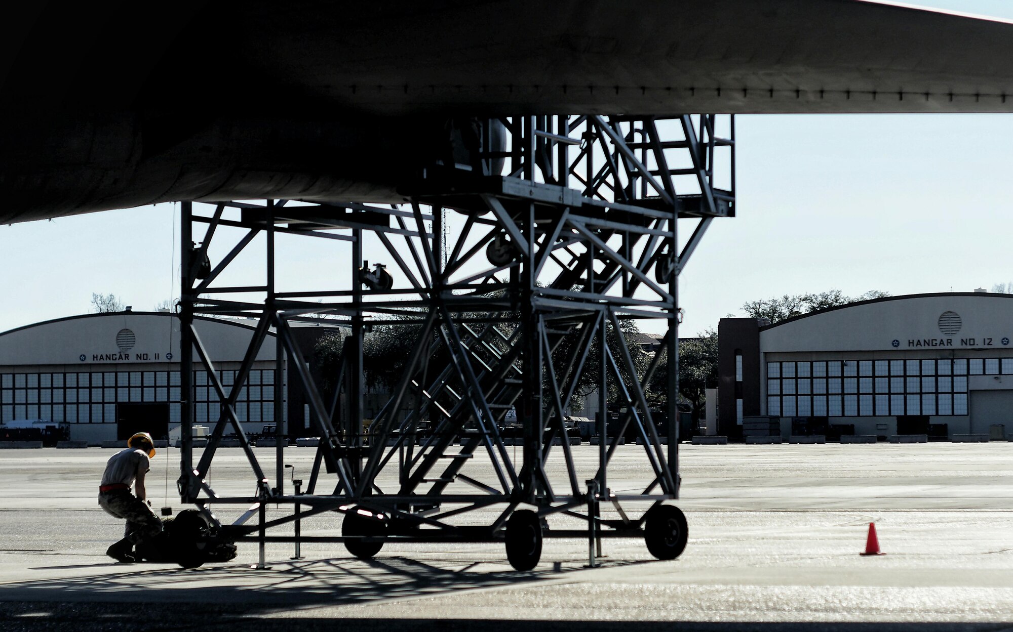 A crew chief from the 20th Aircraft Maintenance Unit prepares to hoist up a drag chute for installation on a B-52 Stratofortress during a Quick Regeneration Exercise at Barksdale Air Force Base, La., Feb. 23, 2017. During landing, the aircraft deploys a drag parachute to assist with deceleration, reducing wear and tear of ceramic brake pads. After parachute deployment, a new one must be installed prior to take-off. (U.S. Air Force photo/Senior Airman Mozer O. Da Cunha)