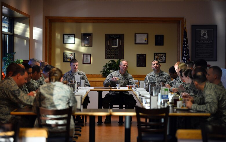 Lt. Gen. Mark D. Kelly, 12th Air Force (Air Forces Southern), eats breakfast with 557th Weather Wing Airmen at the Ronald L. King Dining Facility, Offutt Air Force Base, Neb., Feb. 22, 2017. The 12th AF (AFSOUTH) commander spent the day touring the weather wing as part of an immersion tour. (U.S. Air Force photo by Josh Plueger)