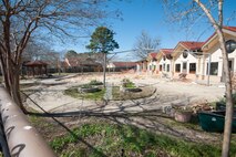 Construction of the Child Development Center outdoor playground is currently ongoing, Feb. 16, 2016, Maxwell Air Force Base, Ala. As building continues, the Freedom Park next door and empty space within the facility have been utilized as a play area for the children. (U.S. Air Force photo/ Bud Hancock)

