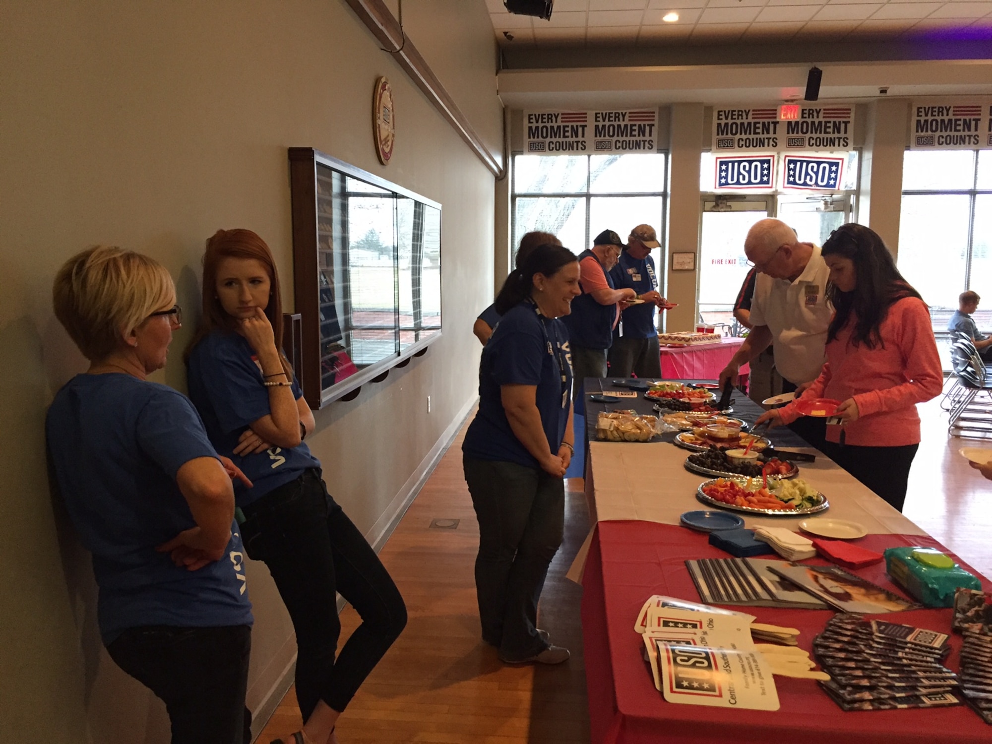 USO Community Center volunteers, donors and Team Wright-Patt members enjoy refreshments during the center’s first anniversary Feb. 24. (Skywrighter photo/Amy Rollins)