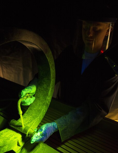 Airman 1st Class Ryan Cherry, from the 133rd Maintenance Squadron, washes a main landing gear drag pin in the magnetic particle unit in St. Paul, Minn., Feb. 26, 2017. Cherry is part of the non-destructive inspection team, which uses noninvasive approaches to inspect aircraft gear for flaws such as cracks, voids and heat damage on aircraft parts utilizing various test equipment. (U.S. Air National Guard photo/Tech. Sgt. Amy M. Lovgren)