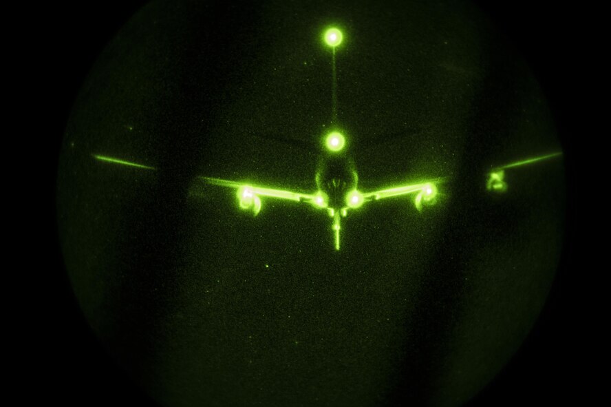 A KC-135 Stratotanker flies above a MC-130J Commmando II during Emerald Warrior at Hurlburt Field, Fla., Feb. 28, 2017. Emerald Warrior is a U.S. Special Operations Command exercise during which joint special operations forces train to respond to various threats across the spectrum of conflict. (U.S. Air Force photo/Staff Sgt. Corey Hook)