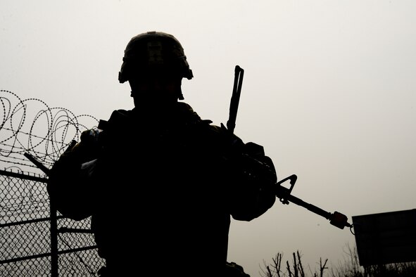 Staff Sgt. William Summerfield, a 51st Security Forces Squadron base defense operations center controller, conducts an “outside the wire” perimeter check during Exercise Beverly Herd 17-1 at Osan Air Base, Republic of Korea, March 1, 2017. The 51st SFS’s mission is to maintain a secure environment and to increase combat power during exercise and real life scenarios. (U.S. Air Force photo/Airman 1st Class Gwendalyn Smith)