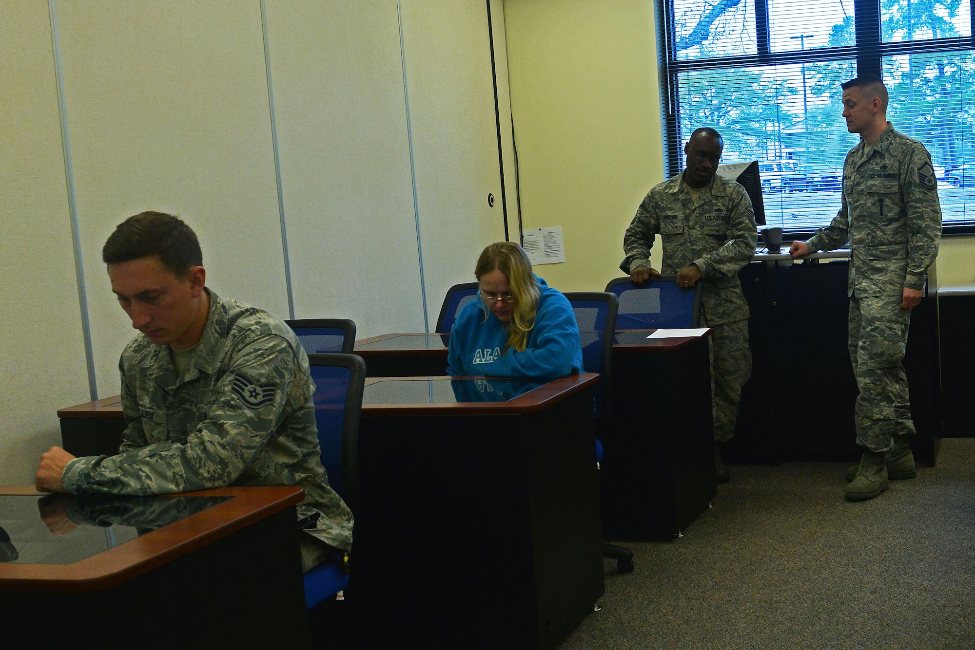 Team Shaw members participate in a College-Level Examination Program Prep-A-Thon session at Shaw Air Force Base, S.C., March 1, 2017. During the session, the proctor administers the test to individuals and gives them information about CLEP tests and Defense Activity for Non-Traditional Education Support Subject Standardized Tests. (U.S. Air Force photo by Airman 1st Class Destinee Sweeney)
