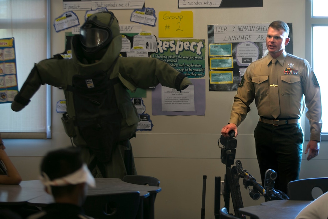 Marines with Explosive Ordnance Disposal answered Painted Hills Middle School students question during a career day in Desert Hot Springs, California.
