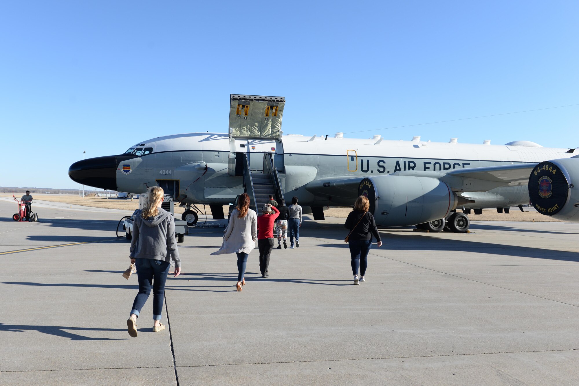 55th Maintenance Squadron spouses take a tour of an RC-135 Rivet Joint aircraft at Offutt Air Force Base, Neb., Feb. 17, 2017. Members of the 55th MXS had a chance to show their spouses what they do for the Air Force.(U.S. Air Force photo by Zachary Hada)