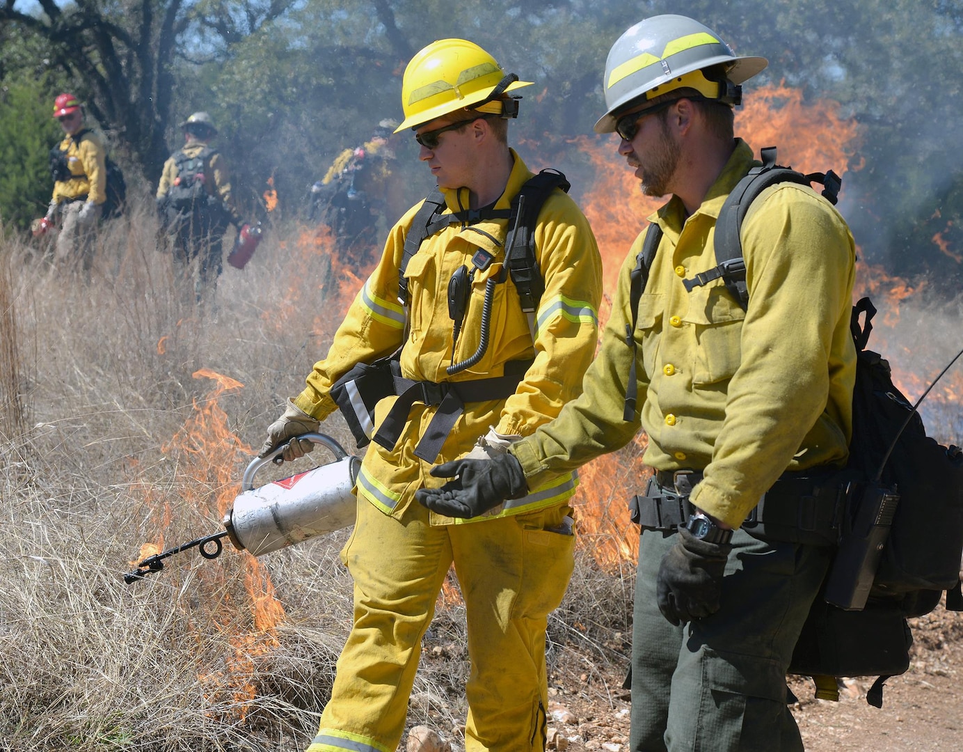 Firefighters burn vegetation at Joint Base San Antonio-Camp Bullis during a controlled burn Feb. 23. Firefighters burned nore than 600 acres of vegetation at the installation during a three-day period from Feb. 22-24, in an effort to prevent wildfires from occurring. The controlled burn was a joint effort between the 502nd Civil Engineering Squadron at JBSA, the U.S. Fish and Wildlife Service, JBSA Fire Emergency Services and area firefighters. 