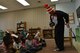 Team Shaw Children laugh as U.S. Air Force Chief Master Sgt. Steven Mullens, 20th Communications Squadron superintendent, pretends to be hurt after sitting on his “tail” at Shaw Air Force Base, S.C., March 2, 2017. Mullens dressed up as the Cat in the Hat while visiting the Chandler Cornell Child Development Center and youth center. (U.S. Air Force photo by Airman 1st Class Destinee Sweeney)