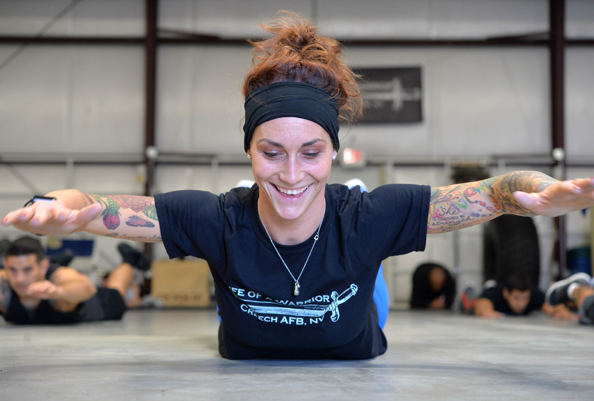 Staff Sgt. Stacey, 799th Air Base Squadron NCO in charge of outbound assignments, participates in Life of a Warrior fitness training Feb. 24, 2017, at Creech Air Force Base, Nev. Stacey has been the point of contact for the Life of a Warrior fitness program for approximately six months. (U.S. Air Force photo/Airman 1st Class Kristan Campbell)