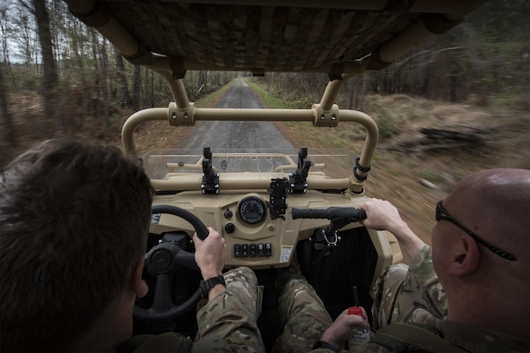 Lt. Col. Mark, 38th Rescue Squadron commander, left, and Maj. Jason, 38th RQS director of operations, travel to Bemiss Field, March 1, 2017, at Grand Bay Bombing and Gunnery Range, Ga.  This was the first time the 38th Rescue Squadron dropped a MRZR and a significant feat as it landed on target, with no damage or discrepancies. (U.S. Air Force photo by Airman 1st Class Daniel Snider)
