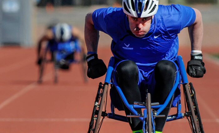 An Air Force Wounded Warrior Trials athlete races toward the finish line during the 400-meter cycling competition of the AFW2 at Nellis Air Force Base, Nev., Feb. 28, 2017. The trials feature multiple events including archery, basketball, cycling, track and field, swimming, shooting and volleyball. (U.S. Air Force photo by Airman 1st Class Kevin Tanenbaum/Released)