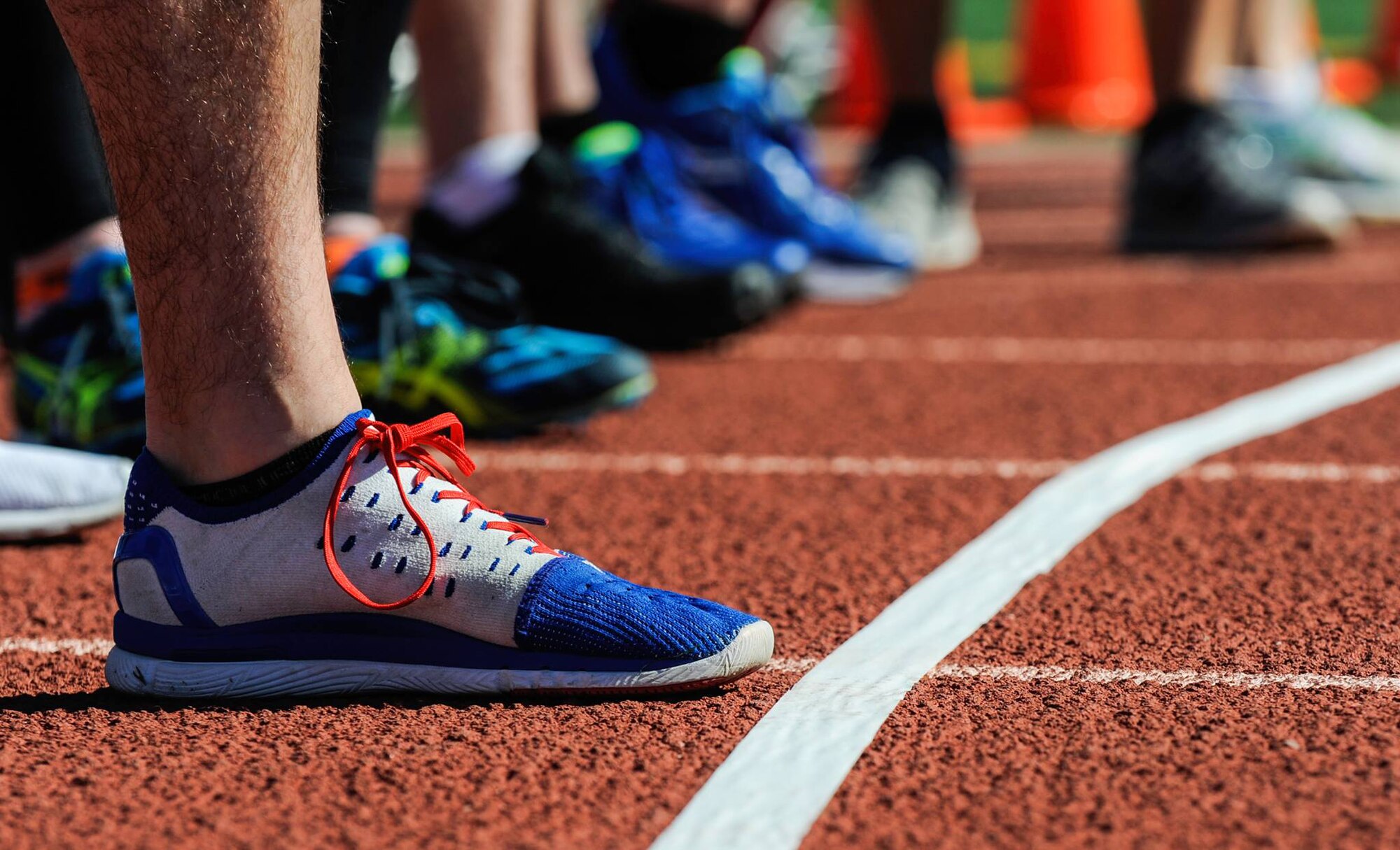 Air Force Wounded Warrior Trials athletes wait for the starter’s pistol before a men’s 400-meter heat during the track competition of the AFW2 at Nellis Air Force Base, Nev., Feb. 28, 2017. The athletes are competing for a chance to participate in the Invictus Games in Toronto. (U.S. Air Force photo by Airman 1st Class Kevin Tanenbaum/Released)