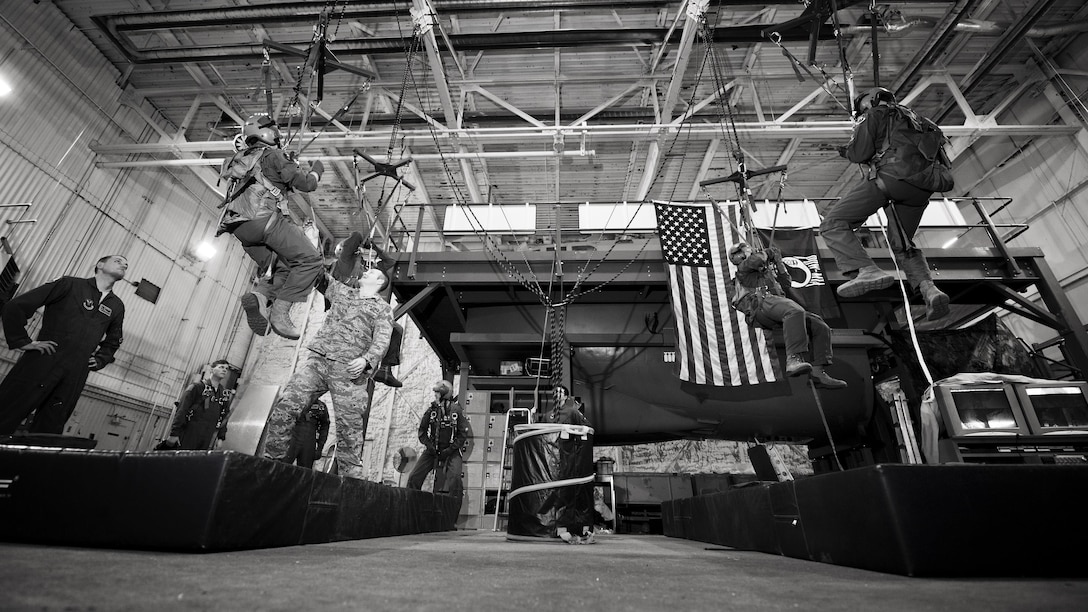 Aircrew Participate In Egress, Emergency Parachute Training