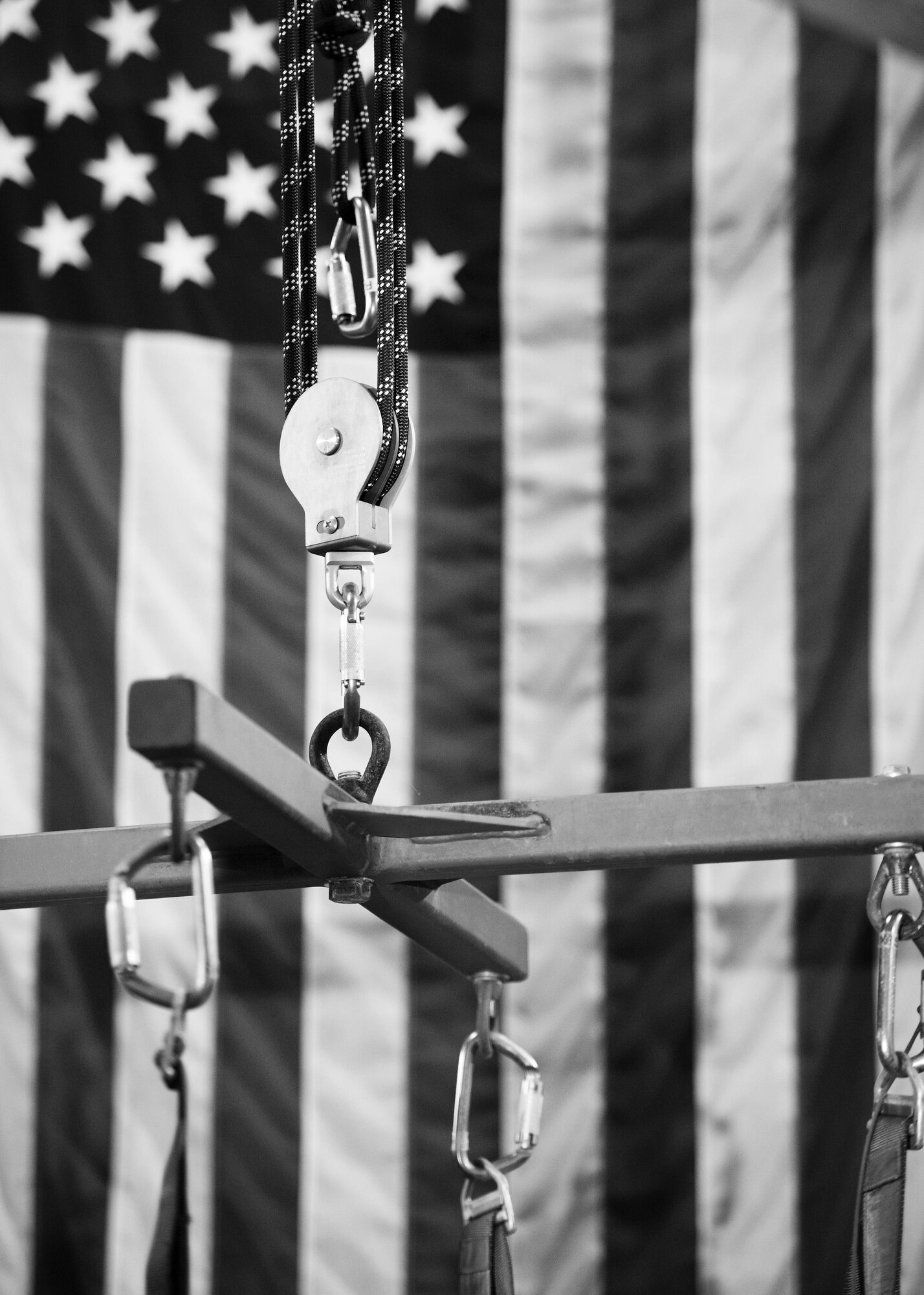 A simulated parachute harness hangs from a ceiling at Minot Air Force Base, N.D., Feb. 22, 2017. Egress and emergency parachute training teaches personnel how to safely exit an aircraft and return to the ground after an emergency. (U.S. Air Force photo/Senior Airman J.T. Armstrong)