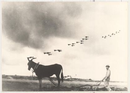 A San Antonio worker tills the ground at Kelly Field in 1919 as squadrons of U.S. planes fly overhead. During the early 20th century, pilots at the airfield had to land on an unpaved segment of dirt and grass.