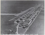 An aerial shot of Kelly Field in 1928 outlines the layout of the airfield. 