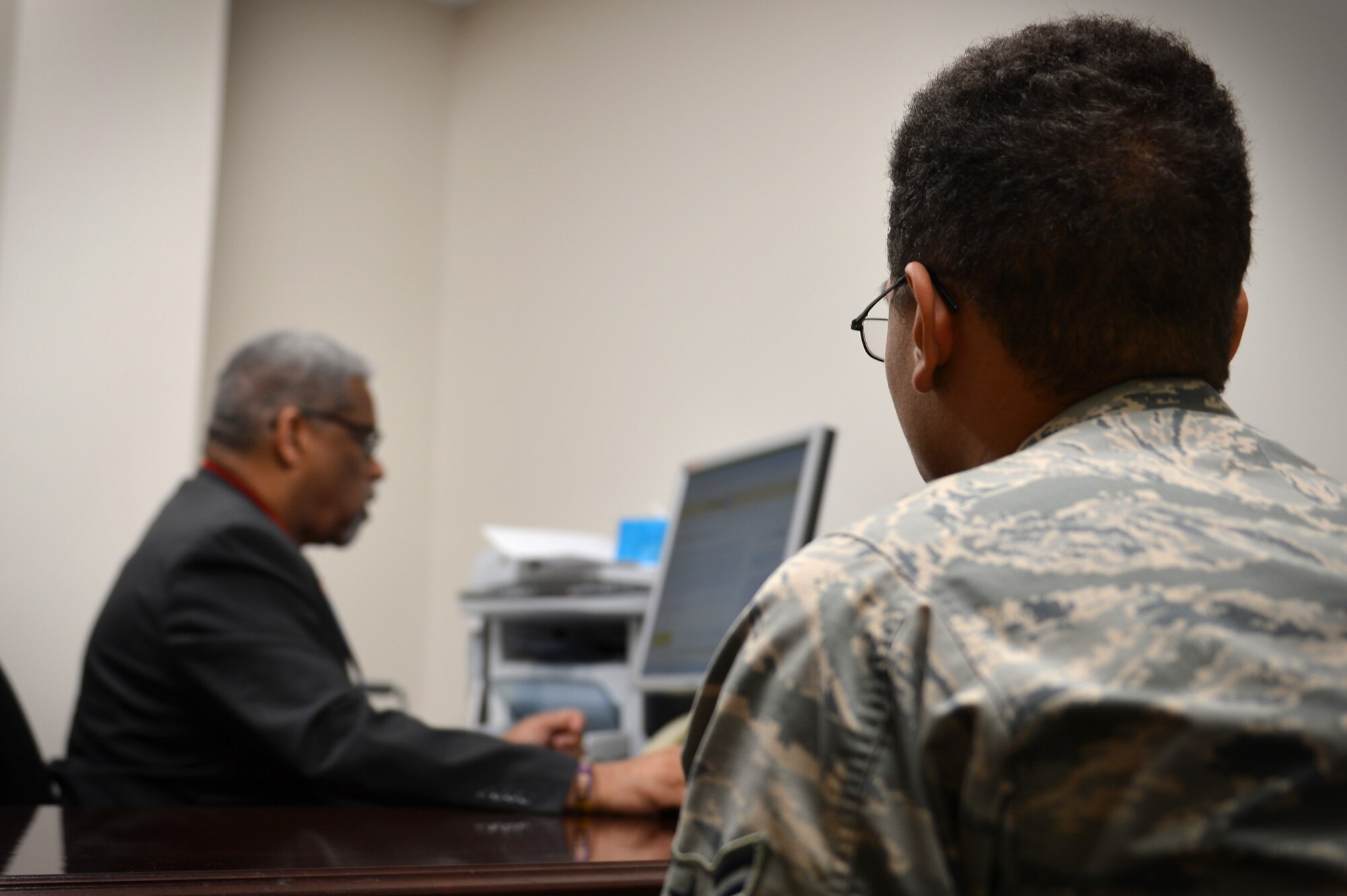 U.S. Air Force Airman 1st Class Joshua Olmeda, 20th Equipment Maintenance Squadron munition systems technician, engages in a one-on-one credit score seminar at the Airman and Family Readiness Center at Shaw Air Force Base, S.C., March 2, 2017. The seminar was part of a Military Saves Week course intended to help base members take the financial high-ground. (U.S. Air Force photo by Airman 1st Class Christopher Maldonado)