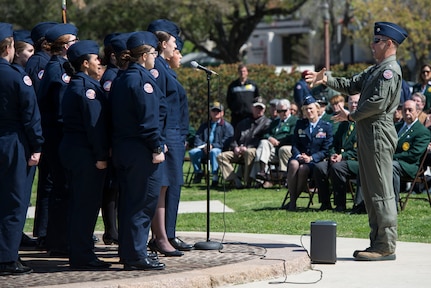 The Floresville High School Air Force Junior ROTC Chorale performs during and event celebrating the anniversary of the first military flight March 2, 2017, at Joint Base San Antonio-Fort Sam Houston, Texas. On March 2, 1910, then-Army Lt. Benjamin Foulois became the first person to make a military flight, from a military facility, in a government owned plane flown by a military-trained pilot.