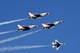 The U.S. Air Force Thunderbirds perform the Arrow Head Loop maneuver Mar. 1 2017, at Creech Air Force Base, Nev. Creech ‘Family Day’ offered weapons displays military working dog demonstrations U.S Air Force Thunderbird performances and more.  (U.S. Air Force photo/Airman 1st Class Adarius D. Petty)