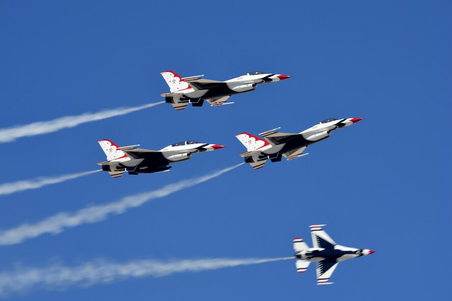 The U.S. Air Force Thunderbirds perform the Arrow Head Loop maneuver Mar. 1 2017, at Creech Air Force Base, Nev. Creech ‘Family Day’ offered weapons displays military working dog demonstrations U.S Air Force Thunderbird performances and more.  (U.S. Air Force photo/Airman 1st Class Adarius D. Petty)
