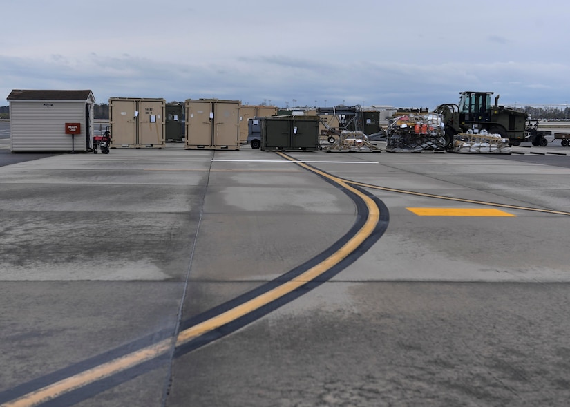 Cargo is placed on the flightline here to be loaded onto aircraft during Exercise Bonny Jack, March 2, 2017. Exercise Bonny Jack was a two-day mobility exercise testing the cargo deployment capabilities of the 437th Airlift Wing. Members of Team Charleston conducted 24-hour operations for the exercise to move 95 short tons of cargo.