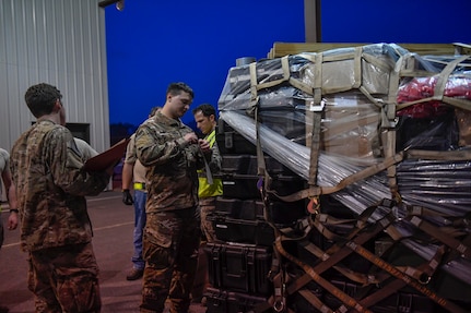 Staff Sgt. Kyle Bushey, 628th Civil Engineer Squadron Explosive Ordnance Disposal flight team chief, labels cargo during Exercise Bonny Jack at the Cargo Deployment Facility here, March 1, 2017. Exercise Bonny Jack was a two-day mobility exercise testing the cargo deployment capabilities of the 437th Airlift Wing. Members of Team Charleston conducted 24-hour operations for the exercise to move 95 short tons of cargo.