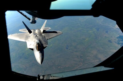 A U.S. Air Force F-22 Raptor assigned to the 90th Fighter Squadron approaches a U.S. Air Force KC-135 Stratotanker in order to receive fuel in the skies above Royal Australian Air Force Base Tindal, Australia, March 2, 2017. Twelve F-22 Raptors and approximately 200 U.S. Air Force Airmen participated in the first Enhanced Air Cooperation, an initiative under the Force Posture Agreement between the U.S. and Australia. 