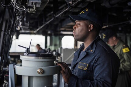 Chief Engineman Paris Pharisien stands conning officer watch aboard the amphibious transport dock ship USS Green Bay (LPD 20) as the ship transits through the South China Sea. Green Bay, with embarked 31st Marine Expeditionary Unit (MEU), transited the South China Sea on a routine patrol, Mar. 2, 2017. Green Bay, with embarked 31st Marine Expeditionary Unit (MEU) is operating in the Indo-Asia-Pacific region to enhance partnerships and be a ready-response force for any type of contingency.