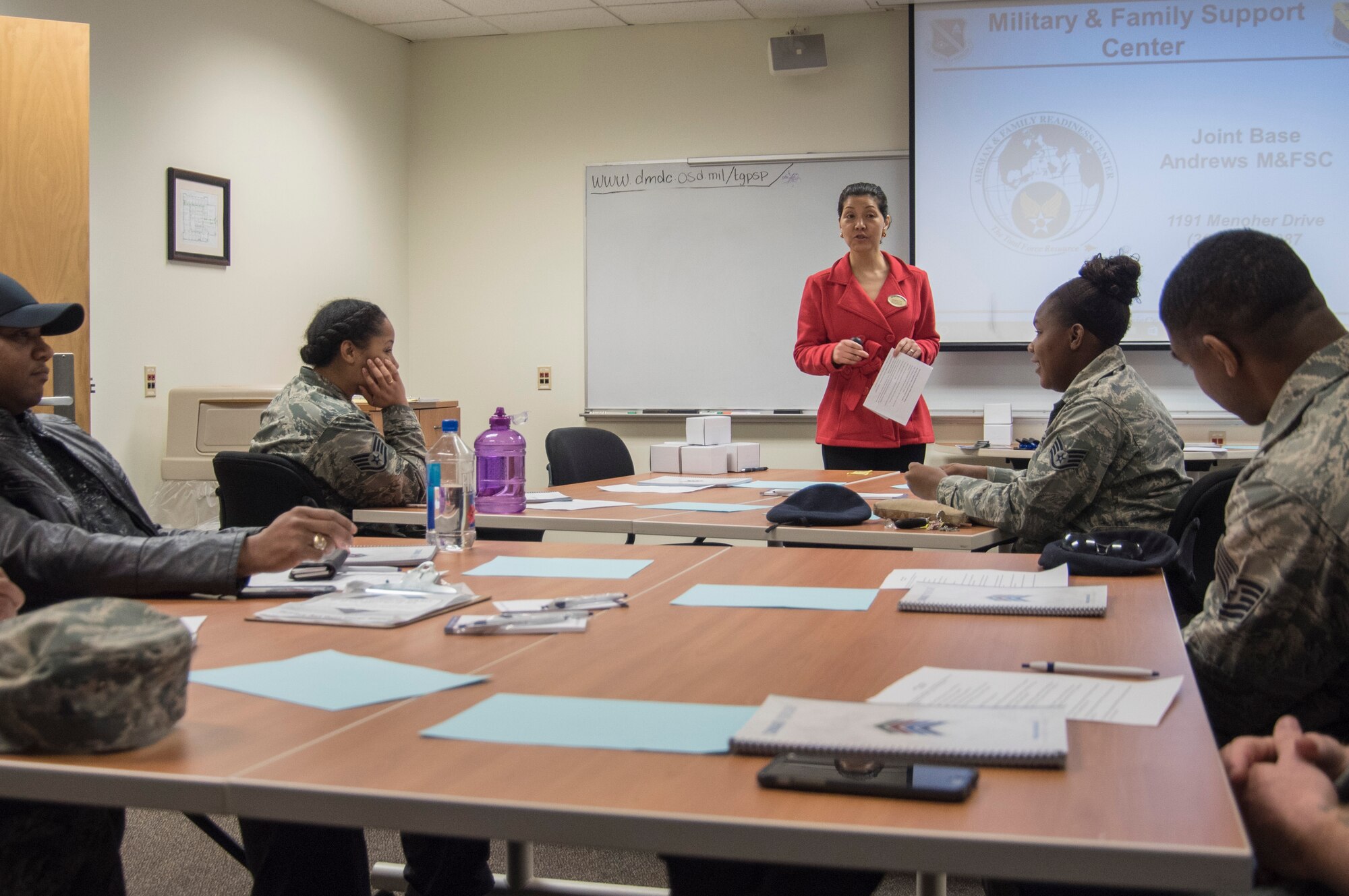 Sanghee Park, 11th Force Support Squadron community readiness specialist, teaches a “Plan! Spend! Save!” seminar during Military Saves Week at Joint Base Andrews, Md., March 3, 2017. The week was dedicated to educating Department of Defense personnel about personal financial matters ranging from debt reduction to retirement planning. (U.S. Air Force photo by Senior Airman Jordyn Fetter)