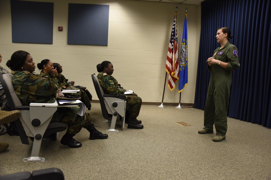Capt. Shannon Davis, 175th Fighter Squadron pilot, shares her experience in the military with the Suriname female officers March 3, 2017 at Joe Foss Field, S.D. Female Officers of the Suriname Army visited with members of the South Dakota Air National Guard as part of a Women in Leadership Subject Matter Exchange program. (U.S. Air National Guard photo by Staff Sgt. Duane Duimstra/Released)