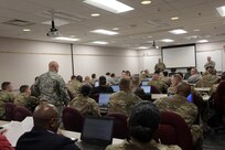 A briefing recipient addresses concerns during an operational mobilization training and assessment brief hosted by the 85th Support Command, at their headquarters outside of Chicago, Mar. 3, 2017.  The briefing was to prepare the 85th Support Command’s Army Reserve logistics support and training support battalions, operationally controlled by First Army, that have been identified for upcoming mobilizations in support of First Army’s post mobilization training requirements at Mobilization Force Generation Installations. Throughout the three-day assessment brief, the command staffs prepare the units in terms of readiness, training, equipment and personnel. The briefing highlights the Army Reserve’s contribution within the multi-component partnership shared with First Army. Army Reserve Soldiers have different mechanisms, and funding allocations to name a few contrasts from their active component partners, but Col. Robert Cooley, Deputy Commander, 85th Support Command, explained that the end state is the same – to get trained Soldiers ready to do their mission whether it is CONUS (Continental United States) or OCONUS (Outside Continental United States). The goal for the three-day event is to establish a unified, synchronized deployment readiness plan for the execution of pre-deployment training.
(U.S. Army photo by Master Sgt. Anthony L. Taylor/Released)