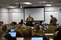 Col. Robert Cooley, Deputy Commander, 85th Support Command, gives opening remarks during an operational mobilization training and assessment brief hosted by the 85th Support Command, at their headquarters outside of Chicago, Mar. 3, 2017.  The briefing was to prepare the 85th Support Command’s Army Reserve logistics support and training support battalions, operationally controlled by First Army, that have been identified for upcoming mobilizations in support of First Army’s post mobilization training requirements at Mobilization Force Generation Installations. Throughout the three-day assessment brief, the command staffs prepare the units in terms of readiness, training, equipment and personnel. The briefing highlights the Army Reserve’s contribution within the multi-component partnership shared with First Army. Army Reserve Soldiers have different mechanisms, and funding allocations to name a few contrasts from their active component partners, but Cooley explained that the end state is the same – to get trained Soldiers ready to do their mission whether it is CONUS (Continental United States) or OCONUS (Outside Continental United States). The goal for the three-day event is to establish a unified, synchronized deployment readiness plan for the execution of pre-deployment training.
(U.S. Army photo by Master Sgt. Anthony L. Taylor/Released)