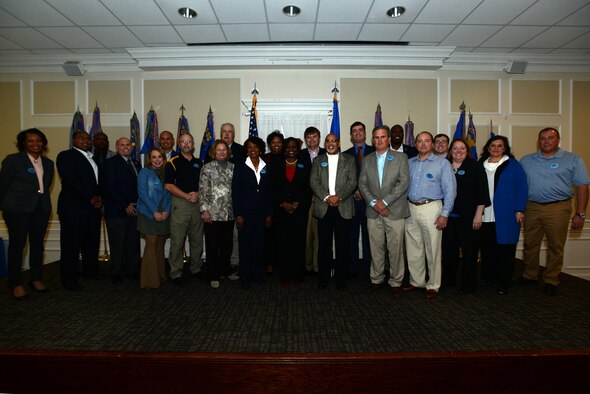 Team Shaw honorary commanders stand for a photo at the Carolina Skies Club and Conference Center at Shaw Air Force Base, S.C., March 3, 2017. Fourteen new honorary commanders were welcomed to the program during a ceremony at the club. (U.S. Air Force photo by Airman 1st Class Kelsey Tucker)