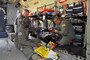 Senior Airman Kayode Idris and Maj. Joel Villavert (front), and Senior Airman Zack Tarson(back) with the 375th Aeromedical Evacuation Squadron prepare medical equipment before conducting an aeromedical evacuation mission on a KC-135R Stratotanker on Feb. 19, 2017. (U.S. Air National Guard photo by Tech. Sgt. Annie Edwards)