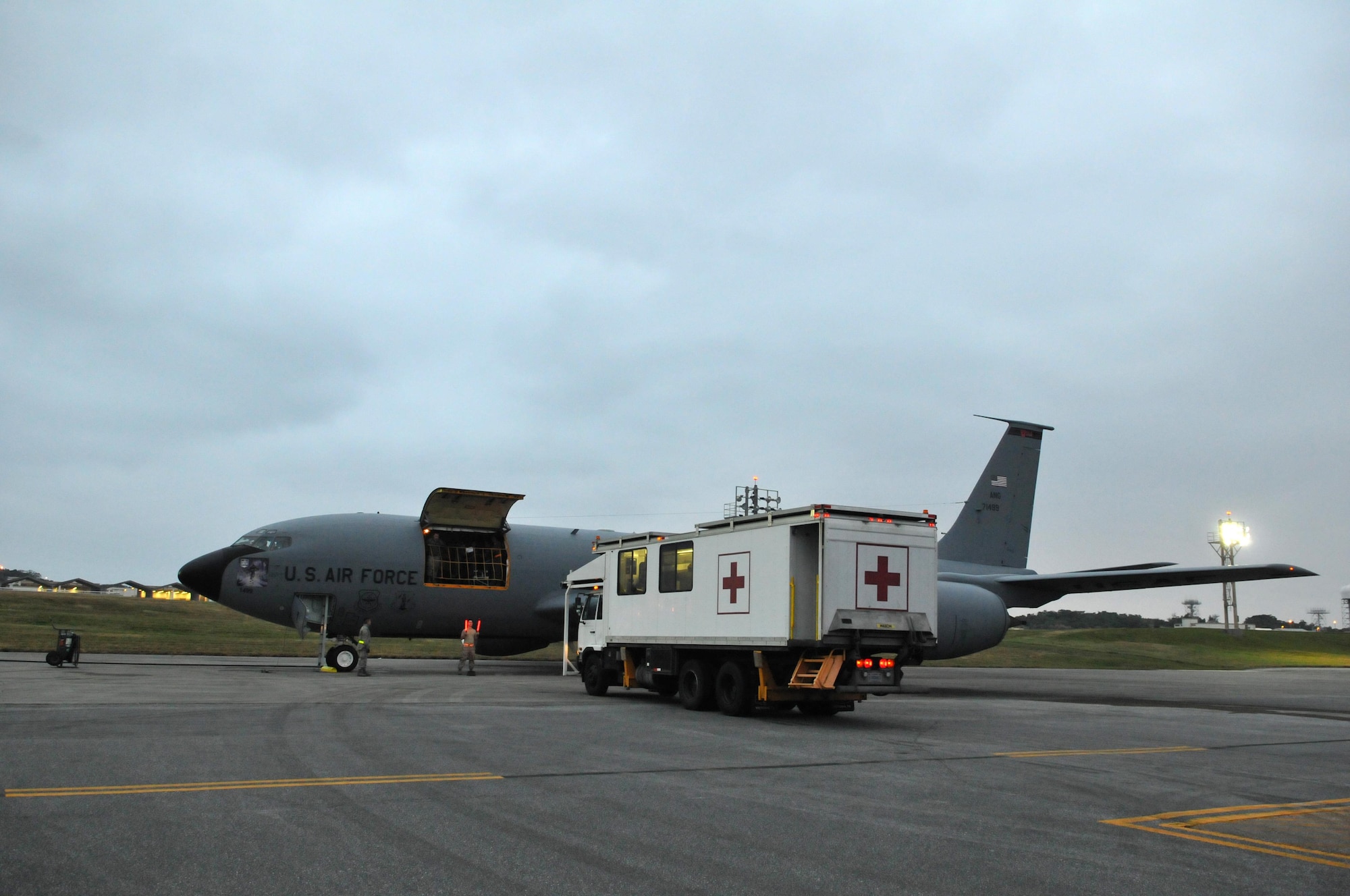 Patients are transported to a Utah Air National Guard KC-135R Stratotanker for an aeromedical evacuation flight to the U.S. from Kadena Air Base, Japan on Feb. 23, 2017. (U.S. Air National Guard photo by Tech. Sgt. Annie Edwards)  