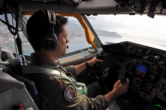 Maj. Phil Schembri, a pilot with the Utah Air National Guard's 151st Air Refueling, flies a KC-135 Stratotanker during an aeromedical evacuation mission transporting patients from the Pacific theater to the U.S. (U.S. Air National Guard photo by Tech. Sgt. Annie Edwards)