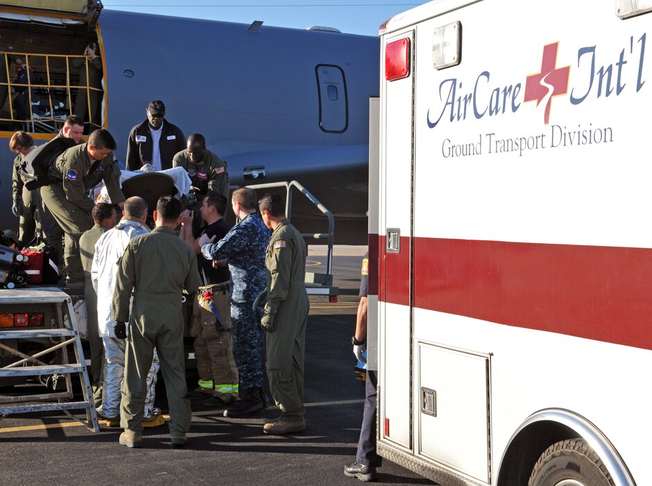 A patient is transferred from a Utah Air National Guard KC-135R Stratotanker to an ambulance after arriving in Naval Air Station North Island in San Diego on Feb. 24, 2017. (U.S. Air National Guard photo by Tech. Sgt. Annie Edwards) 
