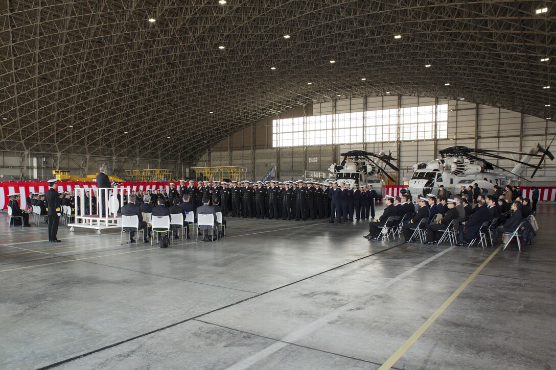 Japan and U.S. service members and guests attend a retirement ceremony to decommission the last two remaining active MH-53E helicopters from service at Marine Corps Air Station Iwakuni, Japan, March 3, 2017. The MH-53E’s flew 6,000 hours throughout 27 years as airborne mine countermeasures and heavy transport helicopters for HM-111. (U.S. Marine Corps photo by Lance Cpl. Joseph Abrego)