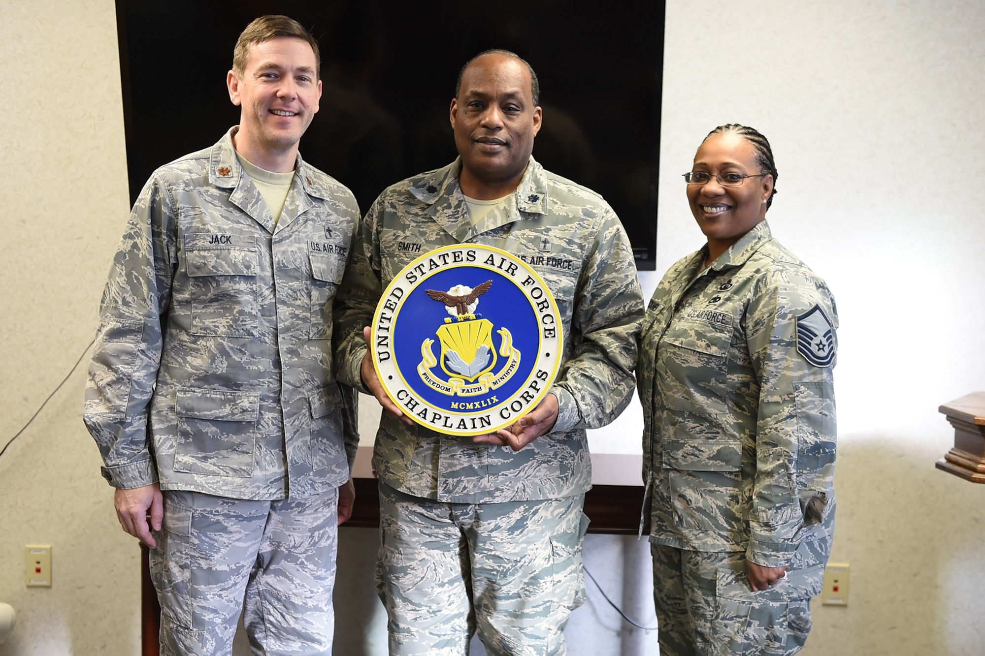 Chaplain (Maj.) Alex Jack and Chaplain (Lt. Col.) Obadiah Smith, both 434th Air Refueling Wing chaplains and Master Sgt. Benita Buckner, 434th Air Refueling Wing chaplain assistant pose for a photo at Grissom Air Reserve base, Ind., Jan. 7th, 2017.  The mission of the 434th Air Refueling Wing chaplain corps is to provide military members and their families opportunities to their constitutional right to the free exercise of religion. (U.S. Air Force photo/Staff Sgt. Jami K. Lancette)