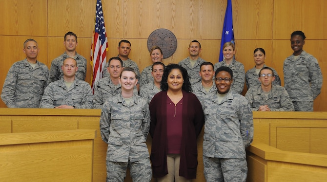 Members from the 6th Air Mobility Wing legal office pause for a photo at MacDill Air Force Base, Fla., Feb. 9, 2017. The legal office is divided into two sections, general law and military justice. (U.S. Air Force photo by Airman 1st Class Mariette Adams)