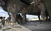 Air Force medics load a simulated patient connected to an extracorporeal membrane oxygenation machine (ECMO) onto a C-17 Globemaster III March 4, 2017 at Patrick Air Force Base, Florida, as part of the 5th Annual MEDBEACH joint medical response exercise.  ECMO is a treatment that uses a pump to circulate blood through an artificial lung back into the bloodstream of a patient. (U.S. Air Force photo/Tech. Sgt. Lindsey Maurice)