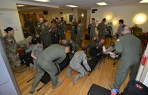 Air Force and Army medics prepare simulated critical care patients before heading out to a C-17 Globemaster III for transport during the 5th annual MEDBEACH joint medical response exercise March 4, 2017 at Patrick Air Force Base, Florida. (U.S. Air Force photo/Tech. Sgt. Lindsey Maurice)