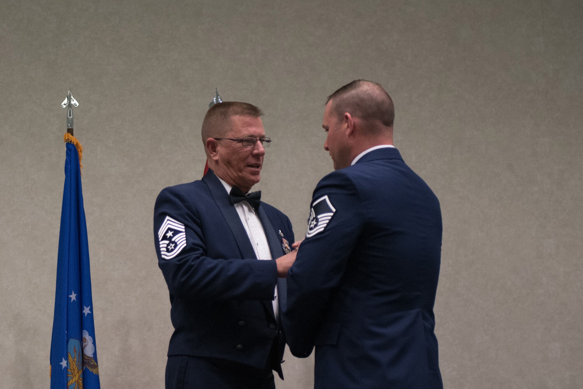 Master Sgt. Jason Sanderson, aircraft mechanic for the 123rd Airlift Wing, receives the Kentucky Enlisted Exceptional Performance Award from Chief Master Sgt. Jeff Moore, Kentucky’s state command chief, during the Soldier and Airman of the Year banquet at the Kentucky Fair and Exposition Center, Louisville, Ky. on March 4, 2017. The winners were selected for their leadership and performance in their primary duties, dedication to self-improvement, and base and community involvement. (U.S. Air National Guard photo by Staff Sgt. Joshua Horton)