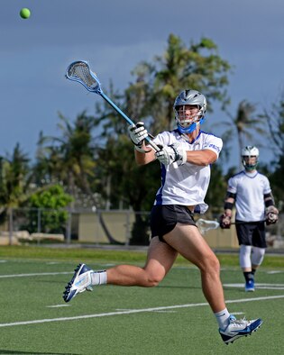 Airman 1st Class Ryan Muller, a member of the Guam Black Tips Lacrosse team, catches the ball Jan. 8, 2016, at Andersen Air Force Base, Guam. Muller has joined the Guam Black Tips, which is Guam's first club lacrosse team, after playing many years before joining the Air Force. Muller is an electrician with the 36th Civil Engineering Squadron. (U.S. Air Force photo by Airman 1st Class Gerald R. Willis)