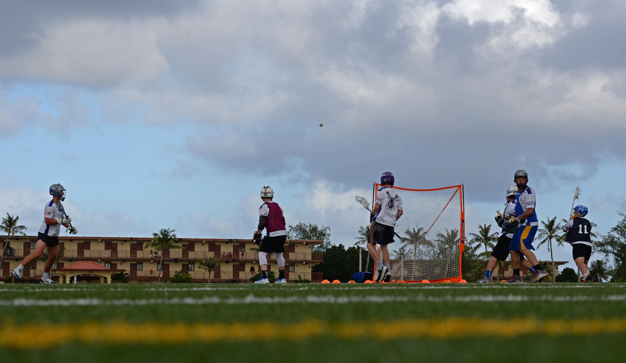 U.S. Air Force and Navy members of the Guam Black Tips lacrosse team scrimmage during practice Jan. 8, 2016, at Andersen Air Force Base, Guam. The Black Tips practice and travel to tournaments in the Indo-Asian-Pacific Region to represent Guam. (U.S. Air Force photo by Airman 1st Class Gerald R. Willis)